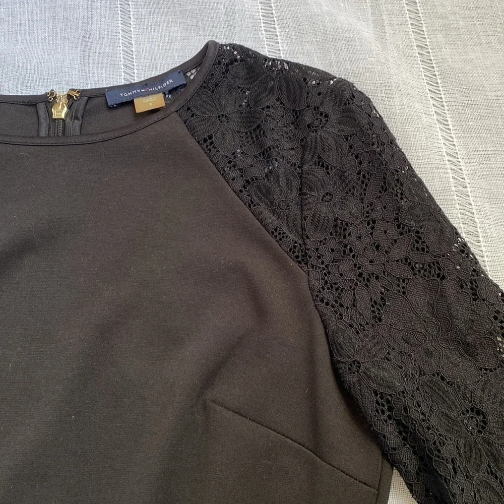 Tommy Hilfiger little black dress with long sleeves lace sleeves.